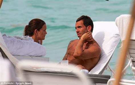 Carlos Tevez And Wife Vanessa On Miami Beach Daily Mail Online