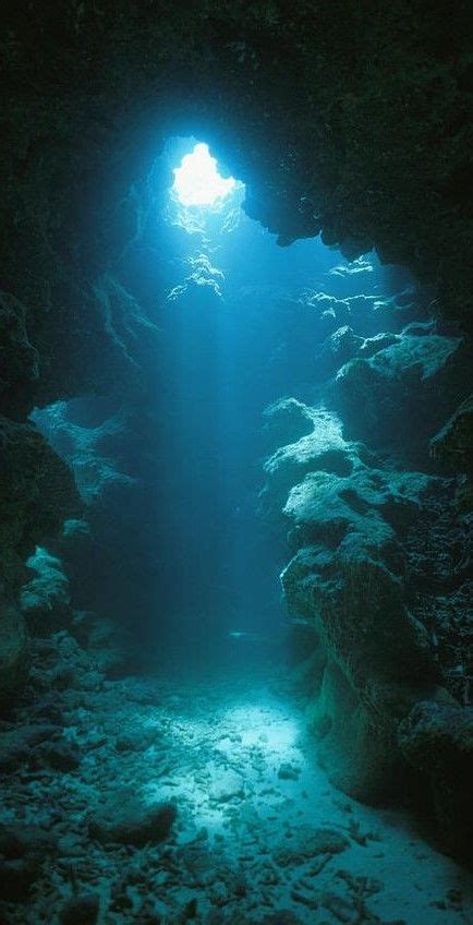 A Beam Of Sunlight Illuminates An Underwater Cave Underwater