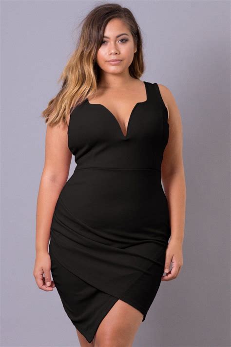 This Plus Size Stretch Knit Dress Features A Plunging Neckline With