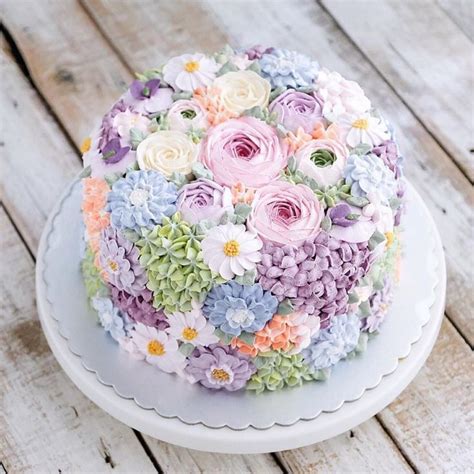 Buttercream Wedding Cake Covered In Flowers By Indonesian