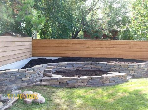 At its simplest, you could even build a. Brick wall with steps and curves to create a stunning ...