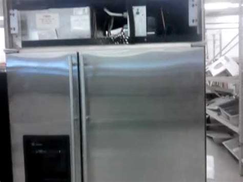 Remove any brackets that keep the fridge attached to the custom cabinetry surrounding the appliance. GE MONOGRAM 42" BUILT-IN SIDE-BY-SIDE REFRIGERATOR - YouTube