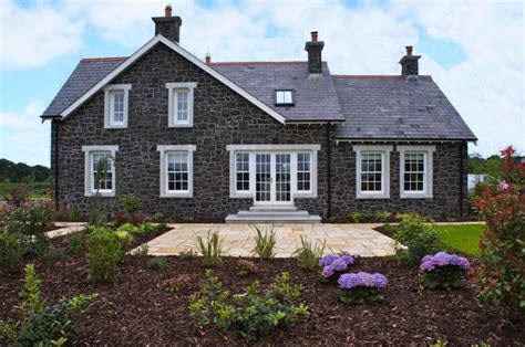 Split Basalt With Reconstituted Granite Window And Door Surrounds