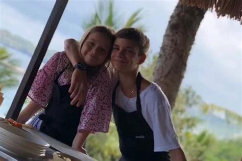 Romeo Beckham Puts Protective Hand Around Little Sister Harper In Adorable Holiday Snap