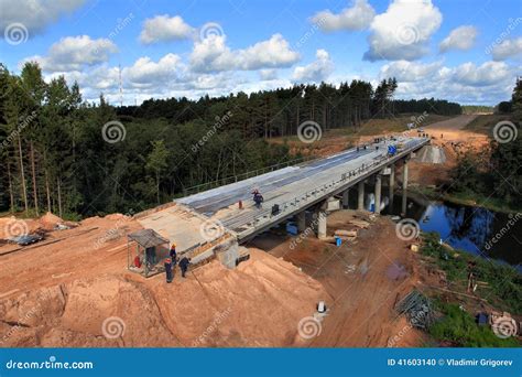 Construction Of A Concrete Bridge Across The River Stream Editorial