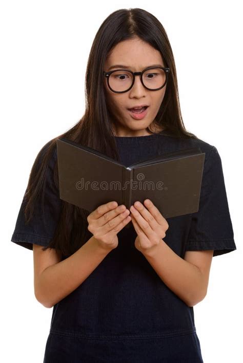 Young Beautiful Asian Teenage Girl Reading Book While Looking Sh Stock Image Image Of Geek
