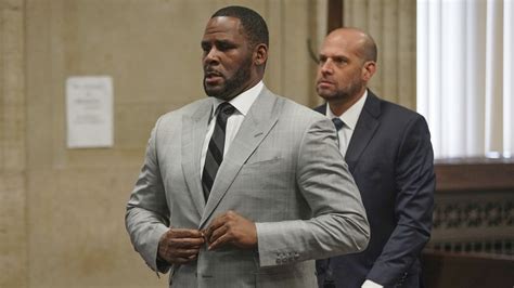 r kelly in court after being arrested over alleged sex crimes with
