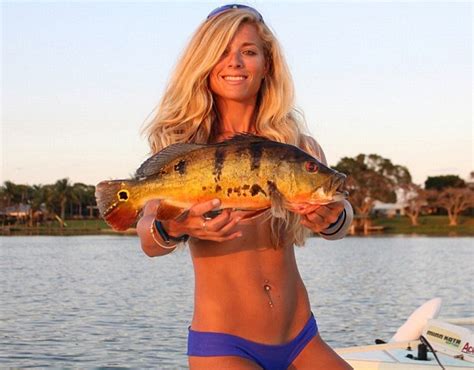 Topless Female Anglers Pose With Fish Covering Their Breasts As Trend Sweeps Instagram Daily