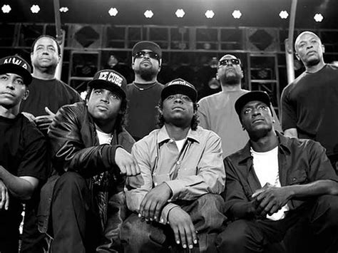 a group of men sitting next to each other