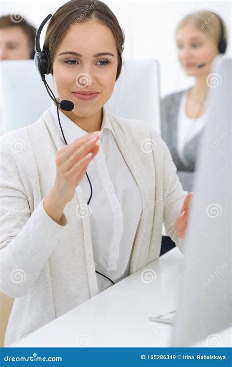 Call Center Group Of Operators At Work Focus On Beautiful Woman