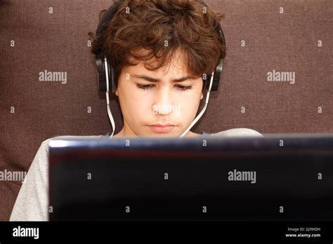 Hispanic Teenage Boy With Headphones Hi Res Stock Photography And