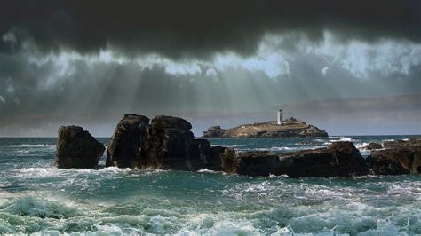Clouds Over Lighthouse In Rough Sea Image Id 49563 Image Abyss
