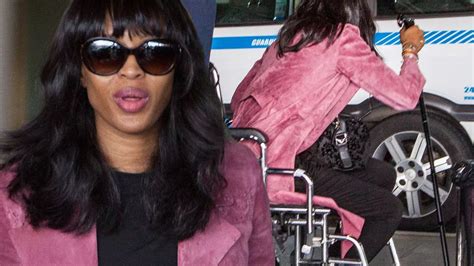 Naomi Campbell Pictured In Wheelchair And Carrying A Cane As She Lands