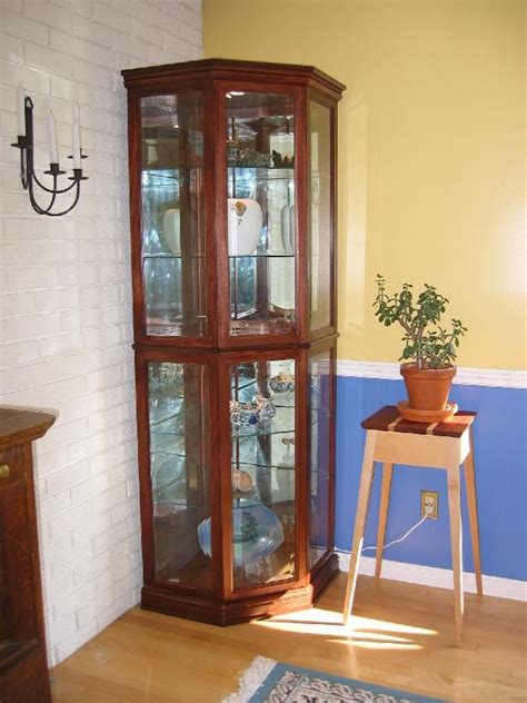 By special reader request, this cute doored cabinet is a fabulous addition to your space, especially if you have items to store and display. Corner Curio Cabinet PDF Plans ... in 2020 | Curio cabinet ...