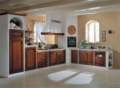 Rich browns in this ovendoor or cabinet kitchen towel make is unique. #Kitchen Idea of the Day: A classic Tuscan kitchen with ...