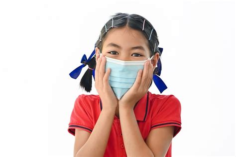 Premium Photo Asian Little Child Girl Is Wearing Medical Face Masks