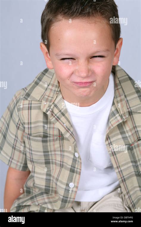 Cute Little Boy Making A Face Stock Photo Alamy
