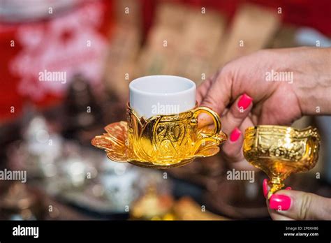Hand Holding Turkish Coffee Cup Stock Photo Alamy