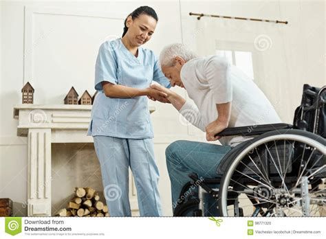Pleasant Senior Man Holding Caregivers Hand Stock Photo Image Of