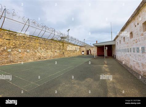 Courtyard With Barbed Wire Of Fremantle Prison Historic Building
