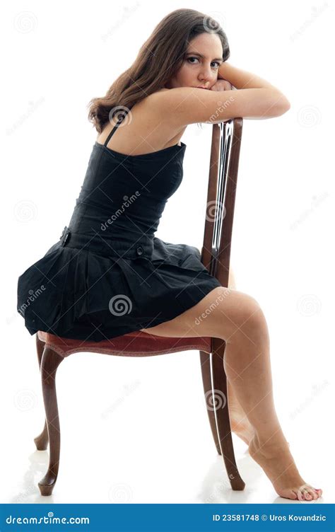 Attractive Brunette Posing On A Chair Stock Photo Image Of Sensual