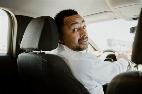 Premium Photo Driver Talking To A Passenger