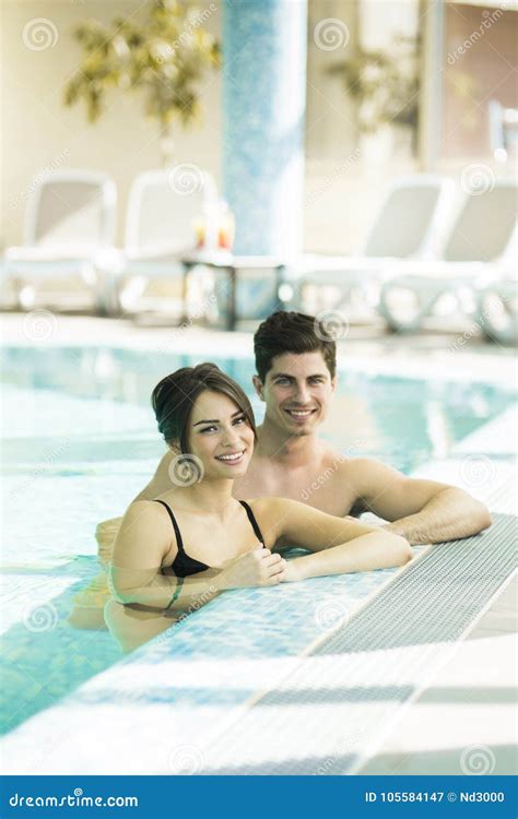 Couple Relaxing By The Side Of The Pool Stock Image Image Of Love