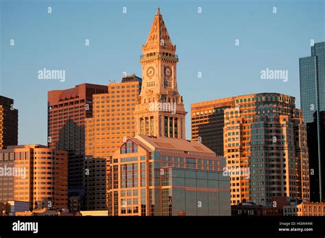 Commerce House Tower Built 1910 And Boston Skyline At Sunrise As