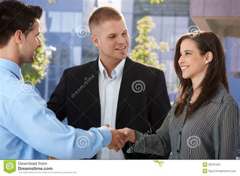 Businesspeople Introducing Outside Of Office Stock Photo - Image of coworkers, handshake: 28761054