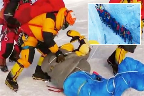 Shocking Moment Sherpas Haul Frozen Solid Corpse From Mount Everest As