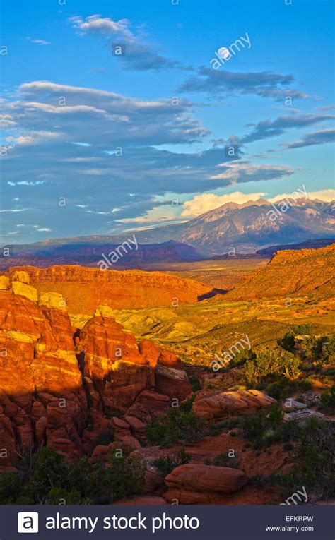 Moon Rise Above The La Sal Mountains With The Fiery Furnace In The
