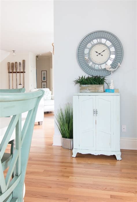This is an interesting design choice for the dining room. Blue and White Coastal Dining Room - The Lilypad Cottage