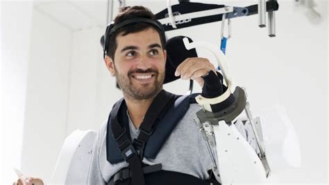 Quadriplegic Man Uses Exoskeleton To Walk And Move Arms Again For The