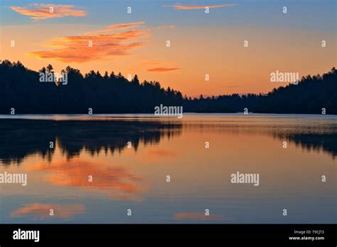 Clouds Reflected In Snake Island Lake At Sunrise The White Bear Forest