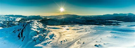 Aerial Panorama Sunset Golden Light Over Norwegian Snowy Winter