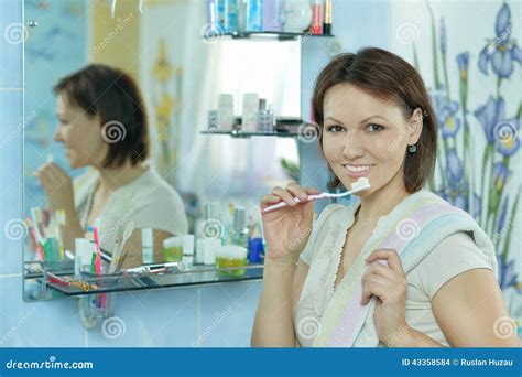 Woman Brushing Her Teeth Stock Photo Image Of Beautiful