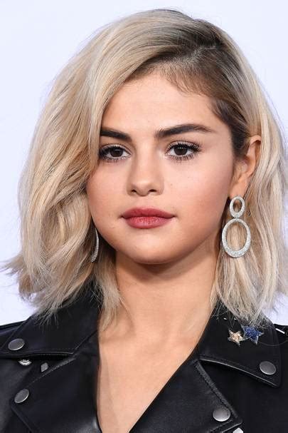 This is a gorgeous peach hair color idea that plays on a peachy blonde from a rose base, the center is parted and the ends beautifully curled. 10 Tips for Bleach Blonde Hair | Glamour UK