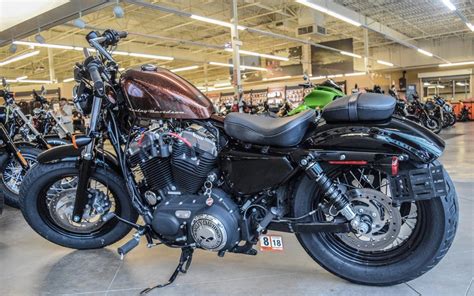 Recalling the iconic rebel styling. 2014 Harley-Davidson® XL1200X Sportster® Forty-Eight ...