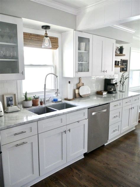 Marble countertops kitchens with cherry cabinets lighting flooring via sgtnate.com. An Honest Review of Carrara Marble Countertops (With ...