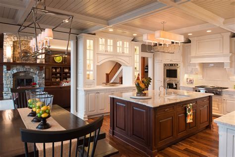 52 dark kitchens with dark wood or black kitchen cabinets (2021!) Traditional White Kitchen with Dark Cherry Island ...