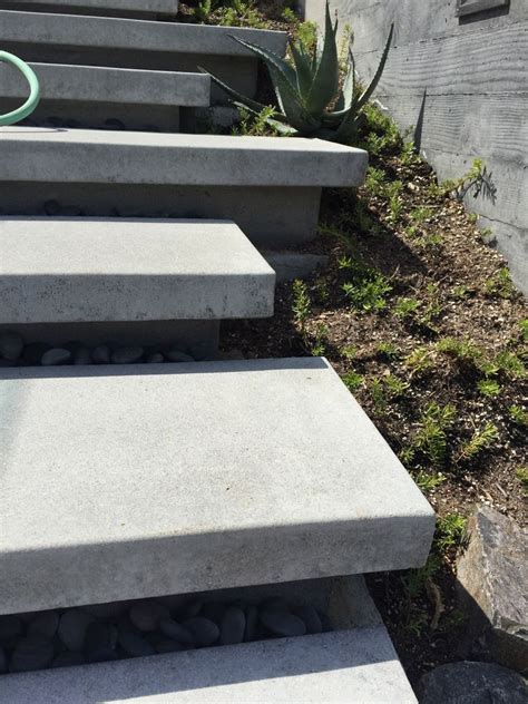 Some Concrete Steps With Plants Growing On Them