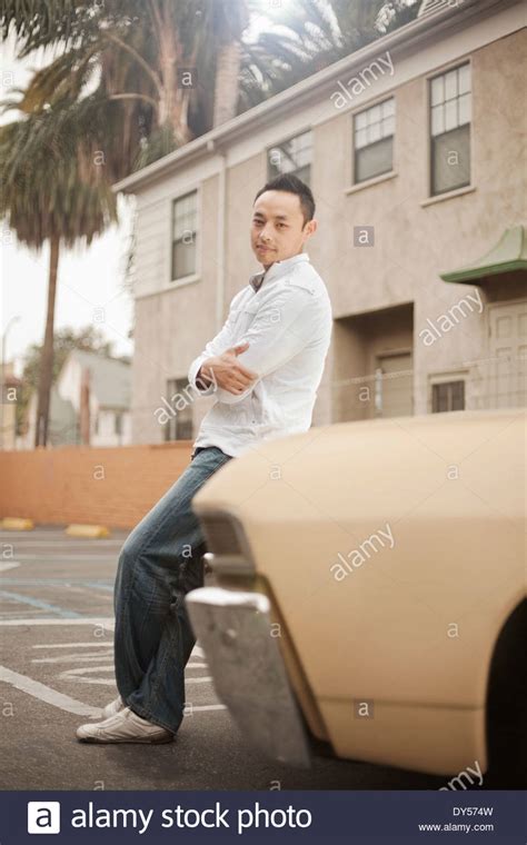 Leaning Against Car 30 Years Stock Photos And Leaning Against Car 30