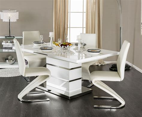 Classic table and chair set is a hallmark addition to any child's room for crafts, drawing and tea time. Veronica Extendable Dining Table w/Four Chairs- White - Black