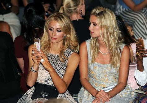 celebrities on their phones at fashion week elle canada