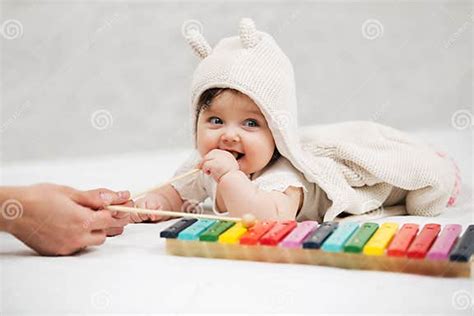 Baby Girl Playing With Xylophone Toy At Home Stock Image Image Of