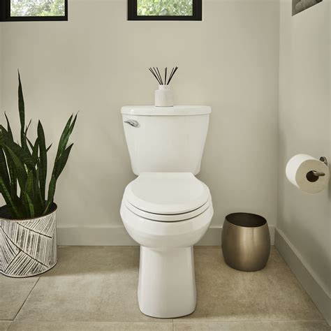 Reliant® Two Piece Standard Height Elongated Toilet With Seat