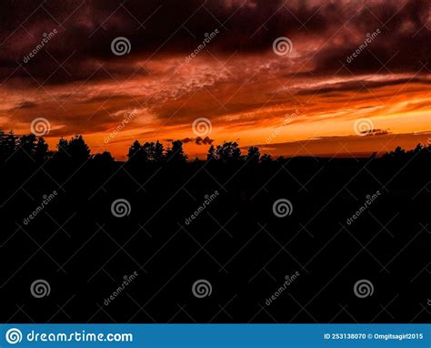 Silhouette With Orange Skies At Sunset Stock Photo Image Of Sunset