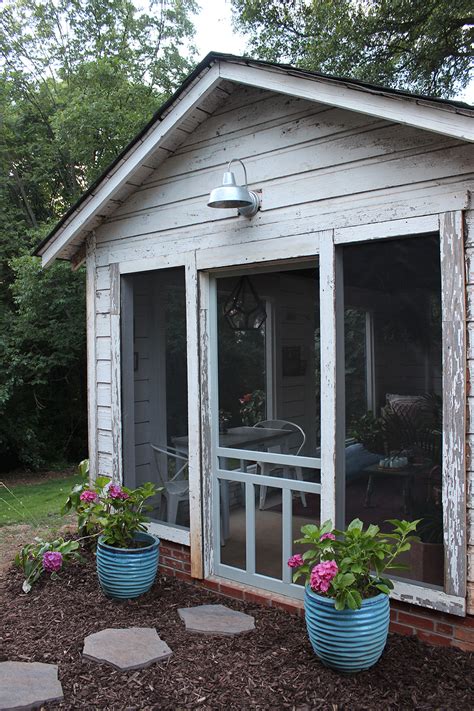 Building a shed with a porch area creates extra space that can be used for storage of large items or simply to rest in the shade. Shed Turned Boho Screened Porch - thewhitebuffalostylingco.com