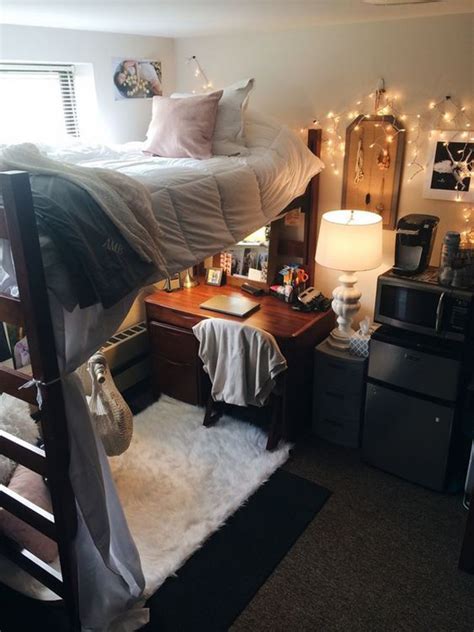 You're going to spend a lot of time at your dorm desk, so you might as well make it functional and productive. cute-dorm-room-bed-organization-with-study-desk | HomeMydesign