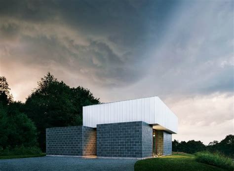 This super-insulated concrete "cabin" hides a surprisingly cozy